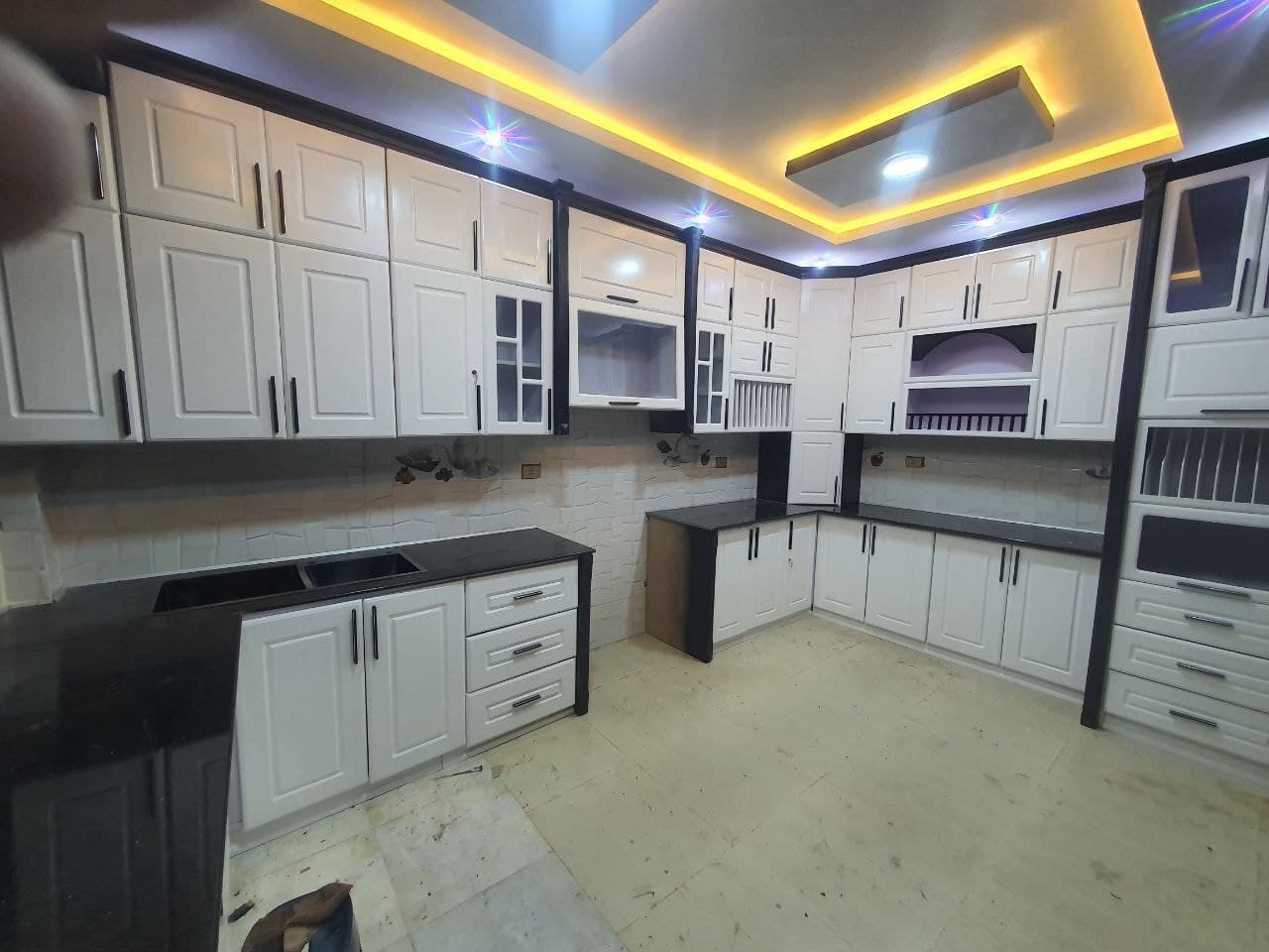 Installed kitchen cabinet run with worktop